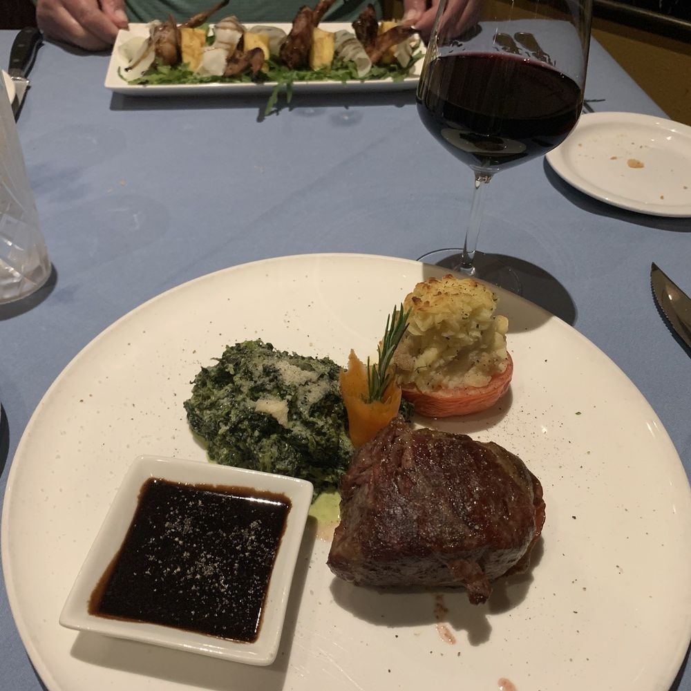 Parma - Filet served with duchess potatoes and spinach Parma style - Italian Near Me - Fresno, California Parma - Filet served with duchess potatoes and spinach Parma style - Italian Near Me - Fresno, California