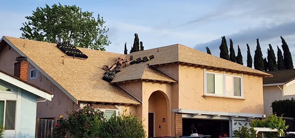Slide of Julio & Family Roofing