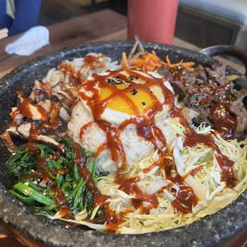 Jin Cook - Hot Stone Bibimbap - picture is after we added the sauce in top. So good!! - Korean Near Me - Northridge, California Jin Cook - Hot Stone Bibimbap - picture is after we added the sauce in top. So good!! - Korean Near Me - Northridge, California