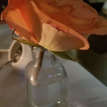 Tallulah Wine Bar and Bistro - Flower on table - New American Near Me - Birmingham, Michigan Tallulah Wine Bar and Bistro - Flower on table - New American Near Me - Birmingham, Michigan