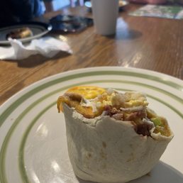I know, I know...I should have taken a photo before diving in. But this breakfast burrito was the perfect morning meal! I know, I know...I should have taken a photo before diving in. But this breakfast burrito was the perfect morning meal!