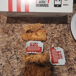 KFC - 4 piece tenders  with fries, soda, $16. They  are a little bigger then the sauce container ...21.1 grams.
