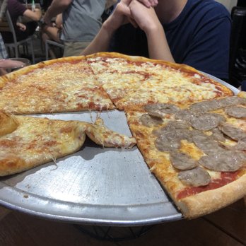 Al's Pizza - Someone was really excited and couldn't wait to have a piece - Pizza Near Me - Jacksonville Beach, Florida