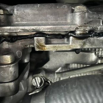 Santa Cruz Subaru Service - Large drip of oil from timing cover and over sealing through bolt hole - Car Dealers Near Me - Capitola, California Santa Cruz Subaru Service - Large drip of oil from timing cover and over sealing through bolt hole - Car Dealers Near Me - Capitola, California