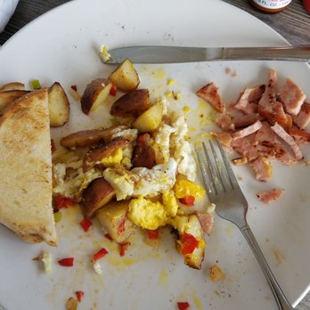 Taste Cafe - 2 eggs, potatoes with peppers and onions and a slice of ham, and toast half way in. - Breakfast & Brunch Near Me - Half Moon Bay, California Taste Cafe - 2 eggs, potatoes with peppers and onions and a slice of ham, and toast half way in. - Breakfast & Brunch Near Me - Half Moon Bay, California