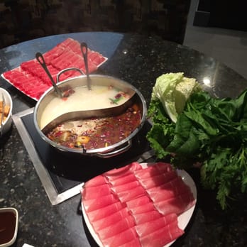 Happy Lamb Hot Pot - Our yummy spread - Assorted veggie platter to the right - Mongolian Near Me - Mountain View, California