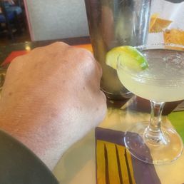 A margarita glass smaller than the back of my hand. A margarita glass smaller than the back of my hand.
