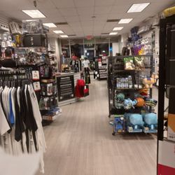 Gamestop - The store and the woman.  Pretending to call guest relations.