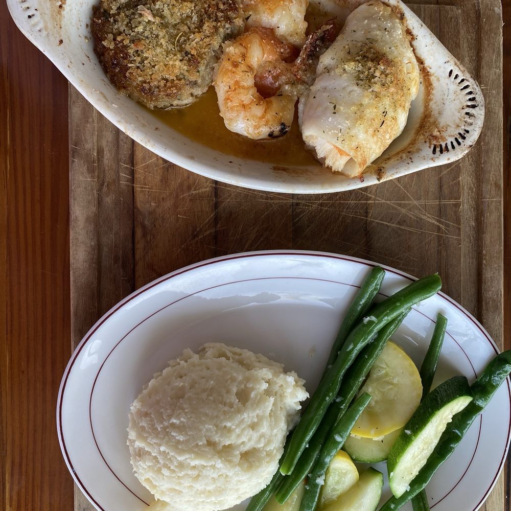 Lakeside Bar & Grill - Seafood trio includes lobster stuffed sole which was to die for. Also a crab cake and 2 large shrimp. Accompaniment on separate plate. - American Near Me - East Hampton, Connecticut Lakeside Bar & Grill - Seafood trio includes lobster stuffed sole which was to die for. Also a crab cake and 2 large shrimp. Accompaniment on separate plate. - American Near Me - East Hampton, Connecticut