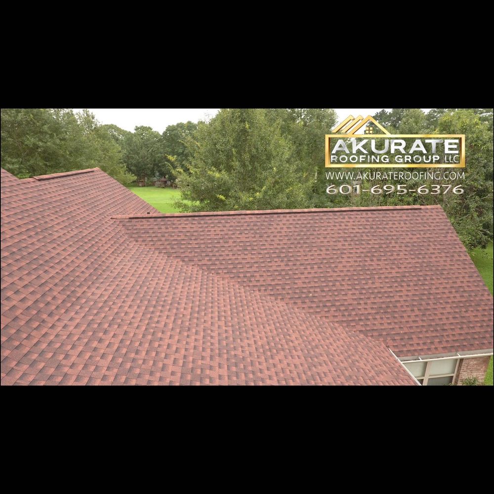 Slide of Akurate Roofing Group