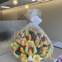 Edible Arrangements - Delicious fruit design with chocolate deep strawberry