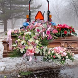 Benta's Funeral Home - Pamela Conner casket by the side of the road.  The ground wasn't settled very unsafe for us to stand on.