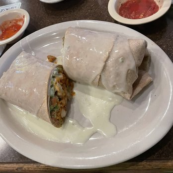 La Rumba - Lunch wrap on a wheat tortilla with chicken, rice, and avocado drizzled with Queso - Mexican Near Me - Jennings, Louisiana La Rumba - Lunch wrap on a wheat tortilla with chicken, rice, and avocado drizzled with Queso - Mexican Near Me - Jennings, Louisiana