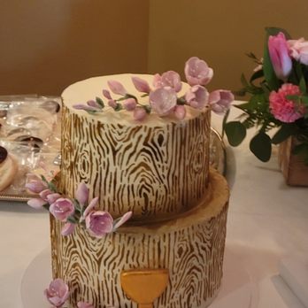 Cakes DeeLux - a three tiered cake on a table - Custom Cakes Near Me - Cuyahoga Falls, Ohio