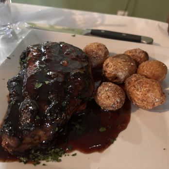Fisherman's Corner - Bone-in pork chop. Outstanding flavor, very tender. - Cajun/Creole Near Me - Pensacola, Florida Fisherman's Corner - Bone-in pork chop. Outstanding flavor, very tender. - Cajun/Creole Near Me - Pensacola, Florida