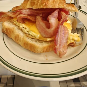 San Gines Beach - Bacon egg and cheese in a croissant - Coffee Roasteries Near Me - Miami Beach, Florida