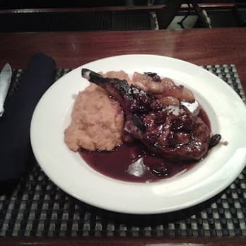 Ditka's Pittsburgh - Ditka's Pork Chop with Cherry saucemashed sweet potatoes and cinnamon apple compote - New American Near Me - Pittsburgh, Pennsylvania