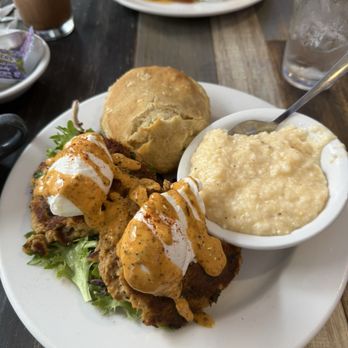 Toast! All Day - Crab cake and fried green tomato Benedict, cheesy grits, with a homemade biscuit. The most popular items on the menu!!! - Breakfast & Brunch Near Me - Savannah, Georgia