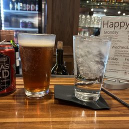 a glass of beer and a can of beer a glass of beer and a can of beer