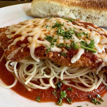 Napolis Italian Kitchen & Market - Chicken Parmigiana. 8 out of 10. I love that every dish comes with a bread stick. - Italian Near Me - Grapevine, Texas Napolis Italian Kitchen & Market - Chicken Parmigiana. 8 out of 10. I love that every dish comes with a bread stick. - Italian Near Me - Grapevine, Texas
