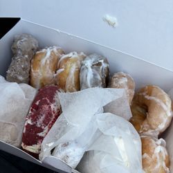 Donut Hole Bakery Cafe - Dozen assorted donuts