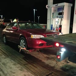 Baileys Towing & Autobody, LLC - Conscientiously hooked up and ready for safe, careful towing by Bailey's Towing & Auto Body, by Mr Bailey himself.
