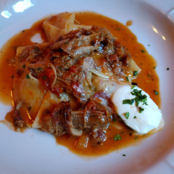Scalini Fedeli - a white plate of food - Italian Near Me - Chatham, New Jersey Scalini Fedeli - a white plate of food - Italian Near Me - Chatham, New Jersey
