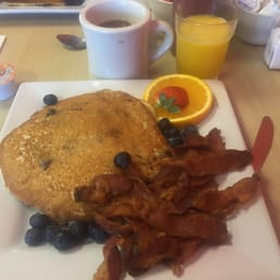 Blueberry pancakes, crispy bacon and fresh squeezed OJ!! Blueberry pancakes, crispy bacon and fresh squeezed OJ!!