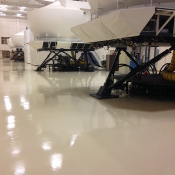 Prepco Flooring - an airplane in a hangar - Flooring Near Me Prepco Flooring - an airplane in a hangar - Flooring Near Me