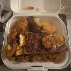 Yum Yum Fast Food - Salmon, shrimp, rice and beans, Mac n cheese virgin island stuffing and plantains, mixed veggies also.