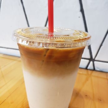 El Tacorrido - a cold beverage in a plastic cup - Mexican Near Me - Austin, Texas