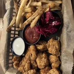 The Sandspur - The Buoy Basket of cornmeal breaded shrimp with fries, slaw, buttermilk ranch, and cocktail sauce