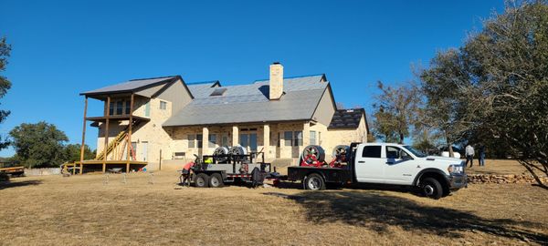 Standing seam surelok McElroy 24 gauge painted roof system install (Black) - This was previously a shingle roof system. We moved the customers into the roof system that they had always desired.
