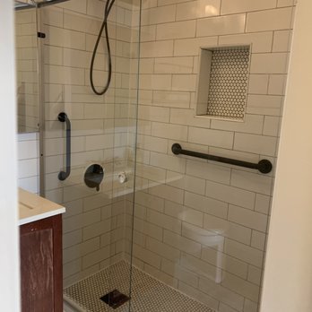 RAF General Contracting - a shower with a glass door - General Contractors Near Me - Staten Island, New York RAF General Contracting - a shower with a glass door - General Contractors Near Me - Staten Island, New York