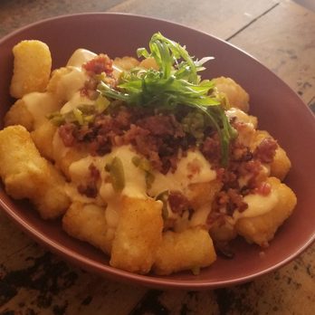 Neighbourhood - Tater tots with bacon and jalapenos - Bars Near Me - Bondi Beach, NSW Neighbourhood - Tater tots with bacon and jalapenos - Bars Near Me - Bondi Beach, NSW