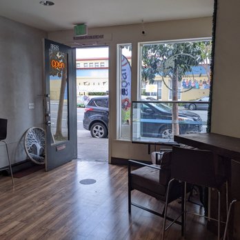 The Brazilian Spot - a car parked in the window - Cafes Near Me - San Francisco, California The Brazilian Spot - a car parked in the window - Cafes Near Me - San Francisco, California