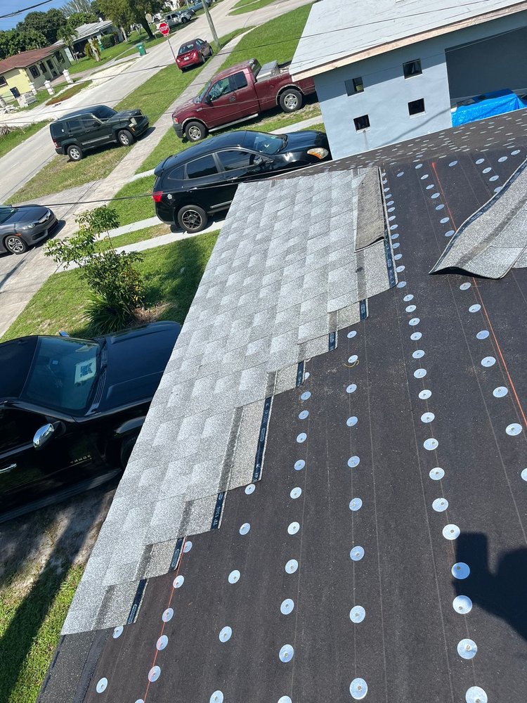 Slide of Advanced Roofing & Construction