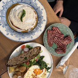 Atelier December - egg platter with turmeric potatoes, coconut pancake, and turkey bacon