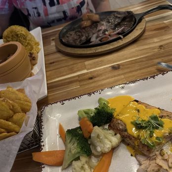 Sazon Y Pilon Kitchen & Bar - Churrasco Steak, Salmon dinner, tostones, rice side - Latin American Near Me - New City, New York