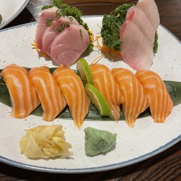 Salmon sushi, yellowtail sashimi, and red snapper sashimi. Salmon sushi, yellowtail sashimi, and red snapper sashimi.