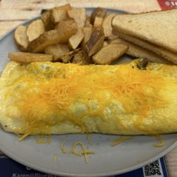 Savannah's Country Buffet - That is a really good looking sausage omelette. Tasted good too. Love the home fries too.