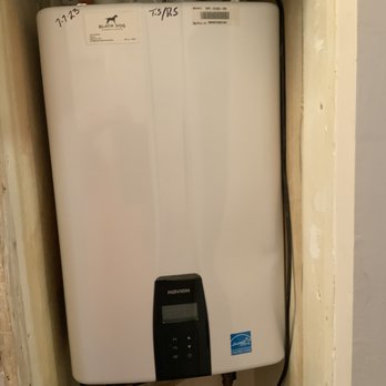 Black Dog Plumbing & Heating - Tankless water heater installed in small closet. - Plumbing Near Me - Framingham, Massachusetts Black Dog Plumbing & Heating - Tankless water heater installed in small closet. - Plumbing Near Me - Framingham, Massachusetts