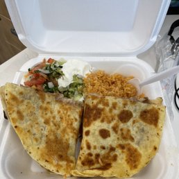 Carnitas quesadilla with beans, side of delicious Spanish Rice , Pico de gallo, Sour Cream and Fresh Guacamole Dip. Carnitas quesadilla with beans, side of delicious Spanish Rice , Pico de gallo, Sour Cream and Fresh Guacamole Dip.