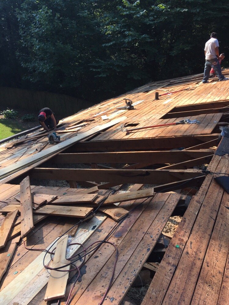 Slide of Kings Point Roofing