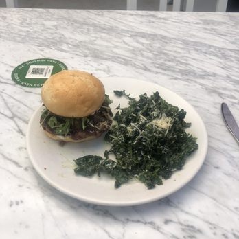 True Food Kitchen - Burger on a gluten free bun with kale salad. - New American Near Me - Columbus, Ohio True Food Kitchen - Burger on a gluten free bun with kale salad. - New American Near Me - Columbus, Ohio