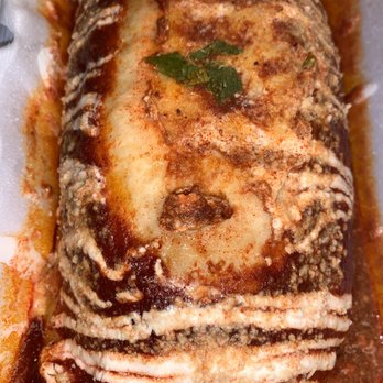 El Purepecha - Wet Carnitas Burrito - this is the biggest burrito I've ever had. - Mexican Near Me - Philadelphia, Pennsylvania El Purepecha - Wet Carnitas Burrito - this is the biggest burrito I've ever had. - Mexican Near Me - Philadelphia, Pennsylvania