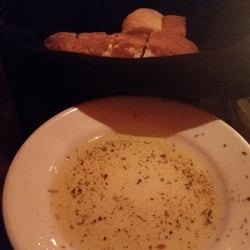Carmines Resturant - Warm bread with good quality olive oil and Italian oregano!!