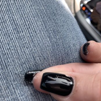 Famous Nails - under the nail left sloppy with chunks of dried acrylic. - Nail Salons Near Me - Albuquerque, New Mexico