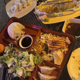 Salmon Teriyaki; California roll; and an already consumed Crazy Roll Salmon Teriyaki; California roll; and an already consumed Crazy Roll