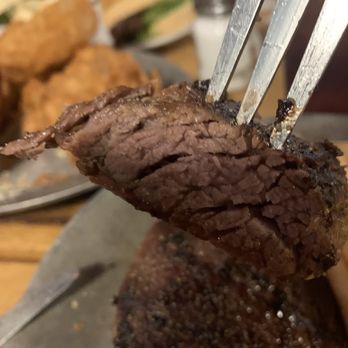 Steer'n Stein - a steak being cut with a fork - Steakhouses Near Me - Moreno Valley, California Steer'n Stein - a steak being cut with a fork - Steakhouses Near Me - Moreno Valley, California